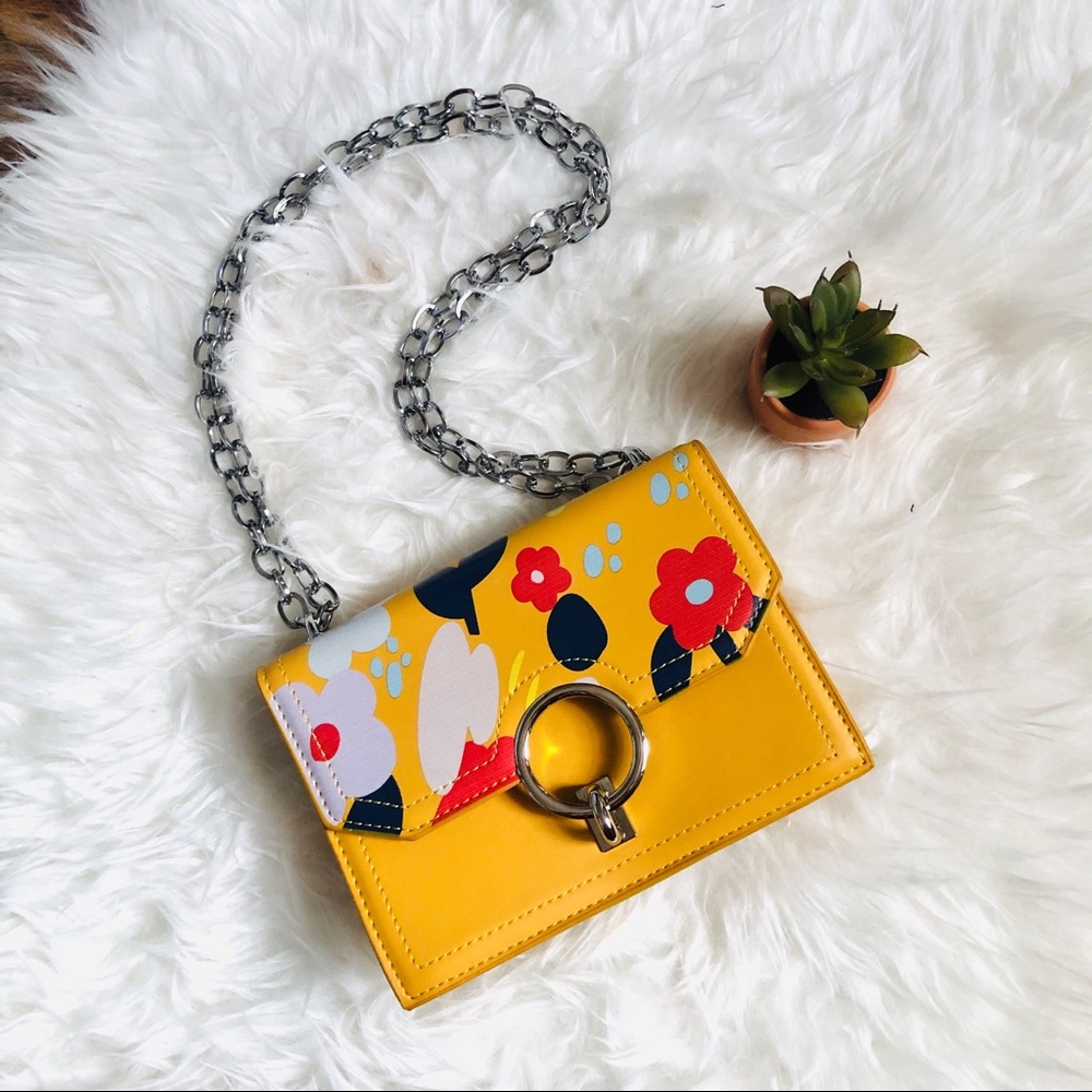 Yellow flower printed handbag w/ O ring buckle